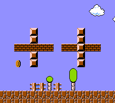 A column of blocks overlapping a row of bricks, and a row of bricks overlapping a column of blocks but with a coin nearby